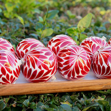 Load image into Gallery viewer, Handblown Glass Ornament – Red &amp; White Swirl
